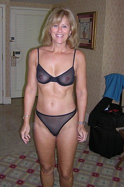 Sexy images of mature housewife poses in her see-through panties and bra